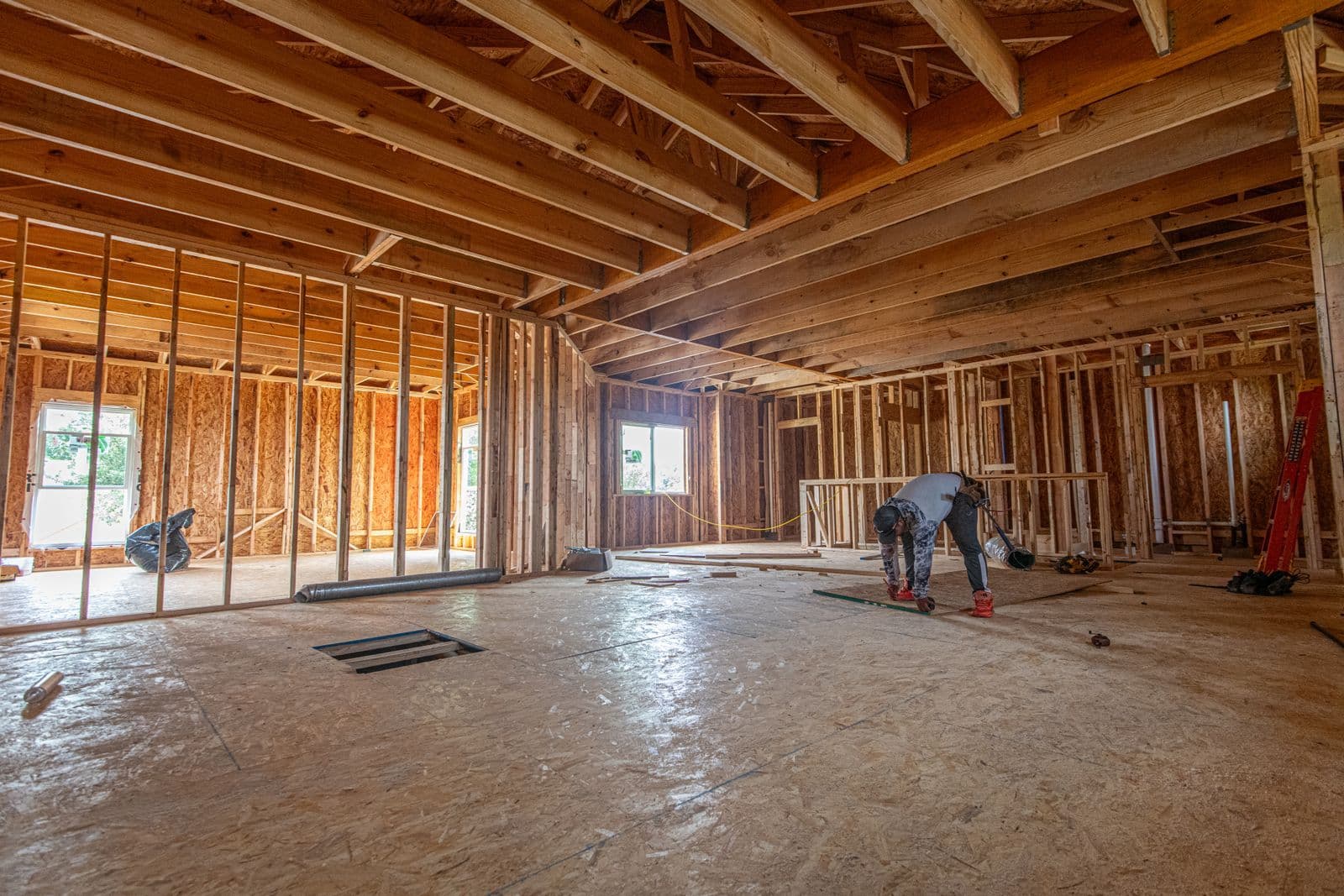 The wood-framed interior of a house under construction